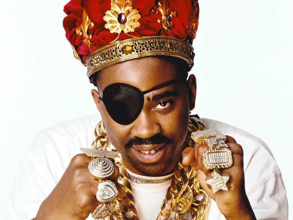 Slick Rick is known for his eyepatch and the crowns he often wears.