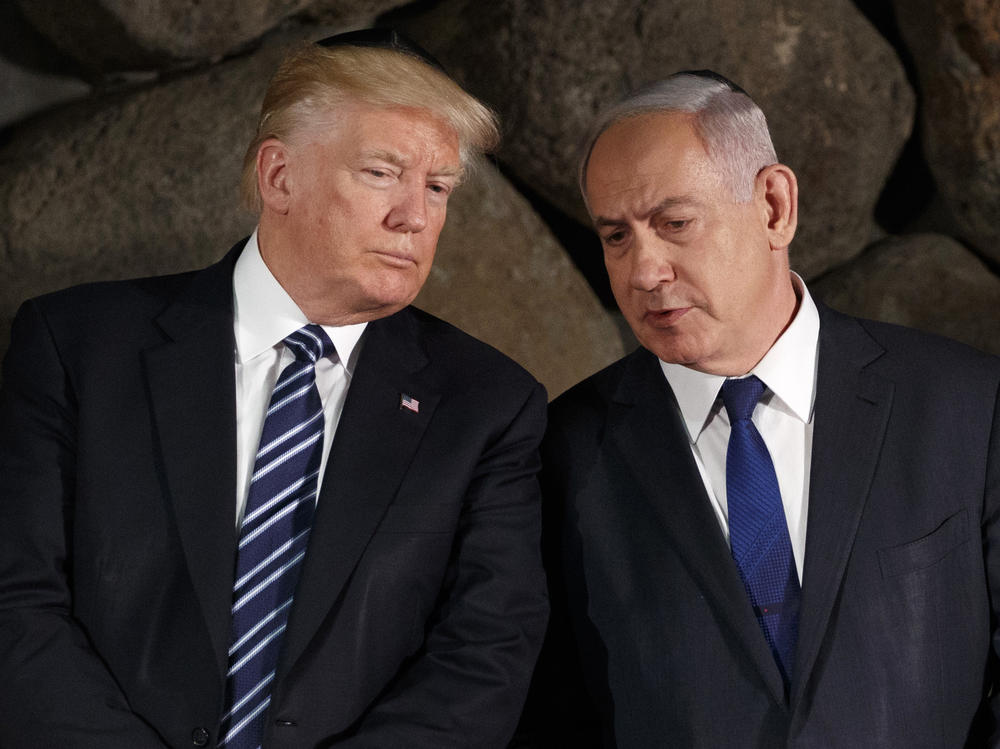 Then-President Donald Trump talks with Israeli Prime Minister Benjamin Netanyahu during a ceremony in 2017 in Jerusalem.