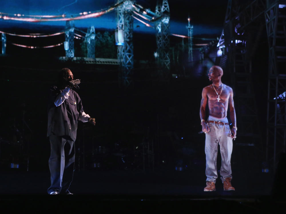 The Ghost of Tupac (right) appears next to Snoop Dogg (left) at the Coachella Valley Music & Arts Festival in 2012