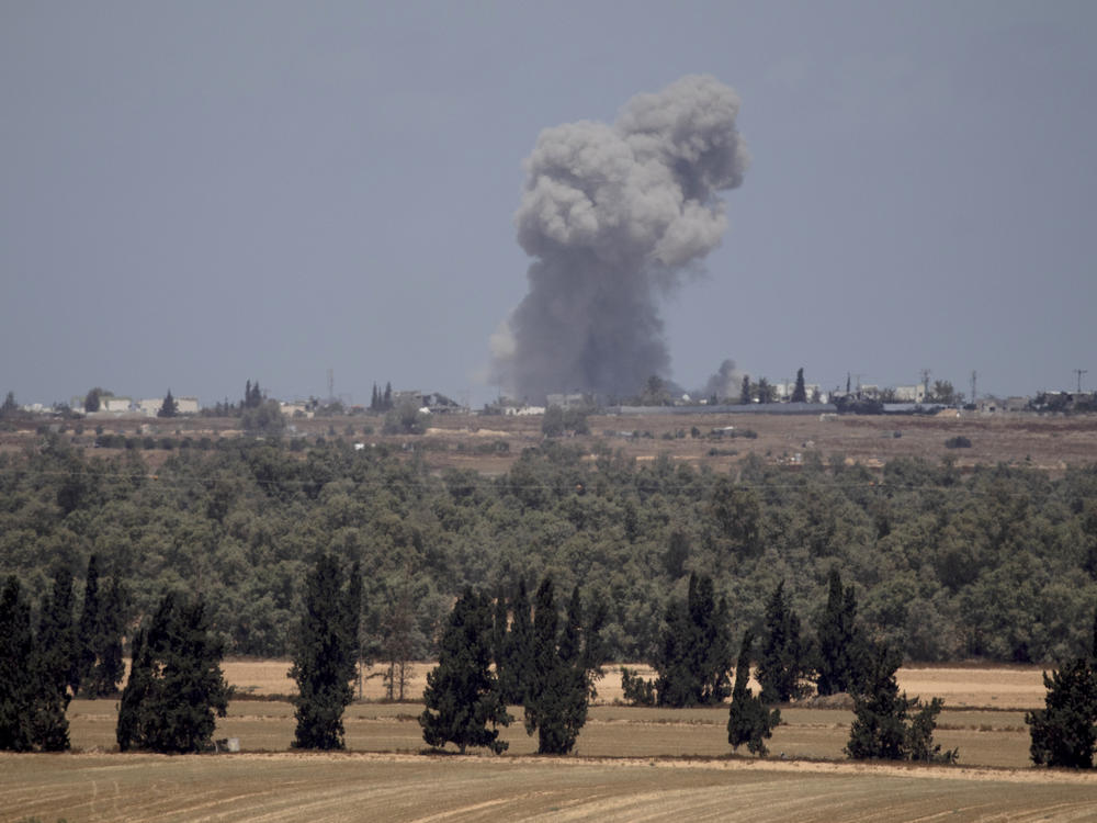Smoke rises over southern Gaza Strip after an Israeli airstrike on May 7.