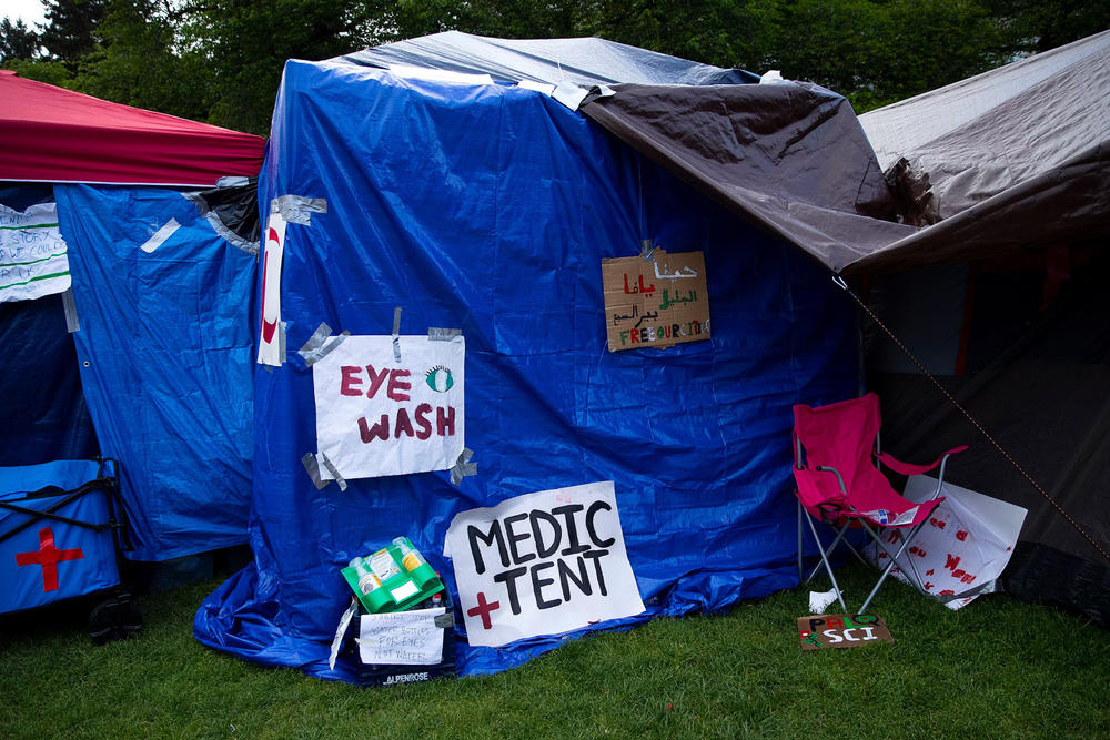 An eye wash station and medic tent are shown at the encampment for Palestine on the University of Washington Quad on Tuesday, May 7, 2024, in Seattle.