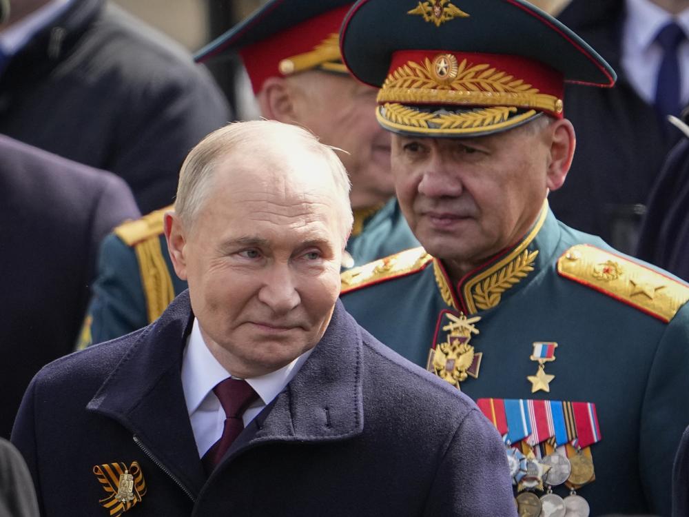 Russian President Vladimir Putin, left, and Russian Defense Minister Sergei Shoigu leave Red Square after the Victory Day military parade in Moscow, Russia, on Thursday.
