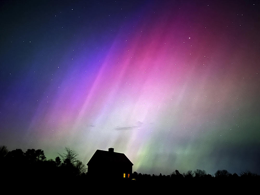 Brunswick, Maine: The northern lights flare in the sky over a farmhouse, late Friday, May 10, 2024.