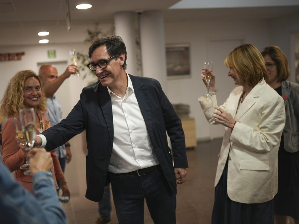 Socialist candidate Salvador Illa makes a toast with members of his team and party colleagues after the announcement of the results of elections to the Catalan parliament in Barcelona on Sunday.