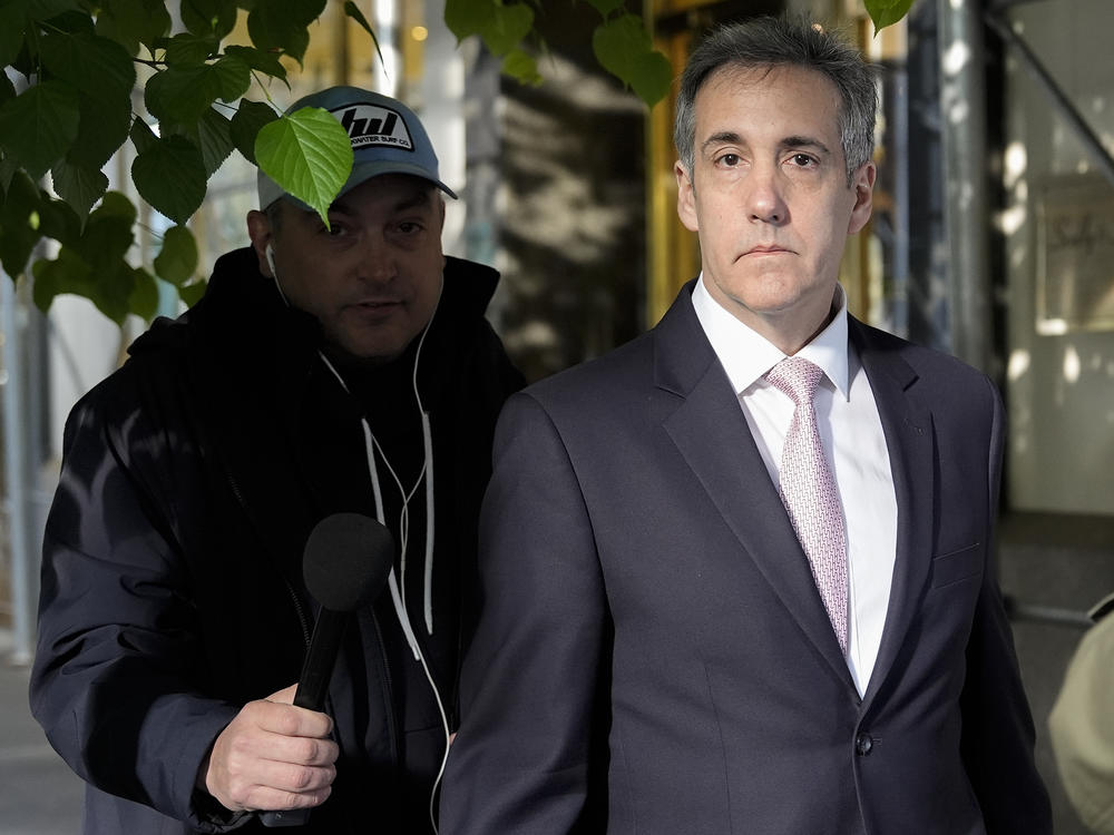 Michael Cohen leaves his apartment building on his way to Manhattan criminal court on Monday.