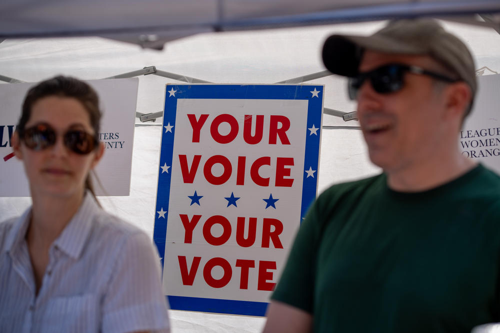 The League of Women Voters of Florida had a table at an Earth Day event in Orlando. The group recently stopped registering voters, citing restrictive state laws.