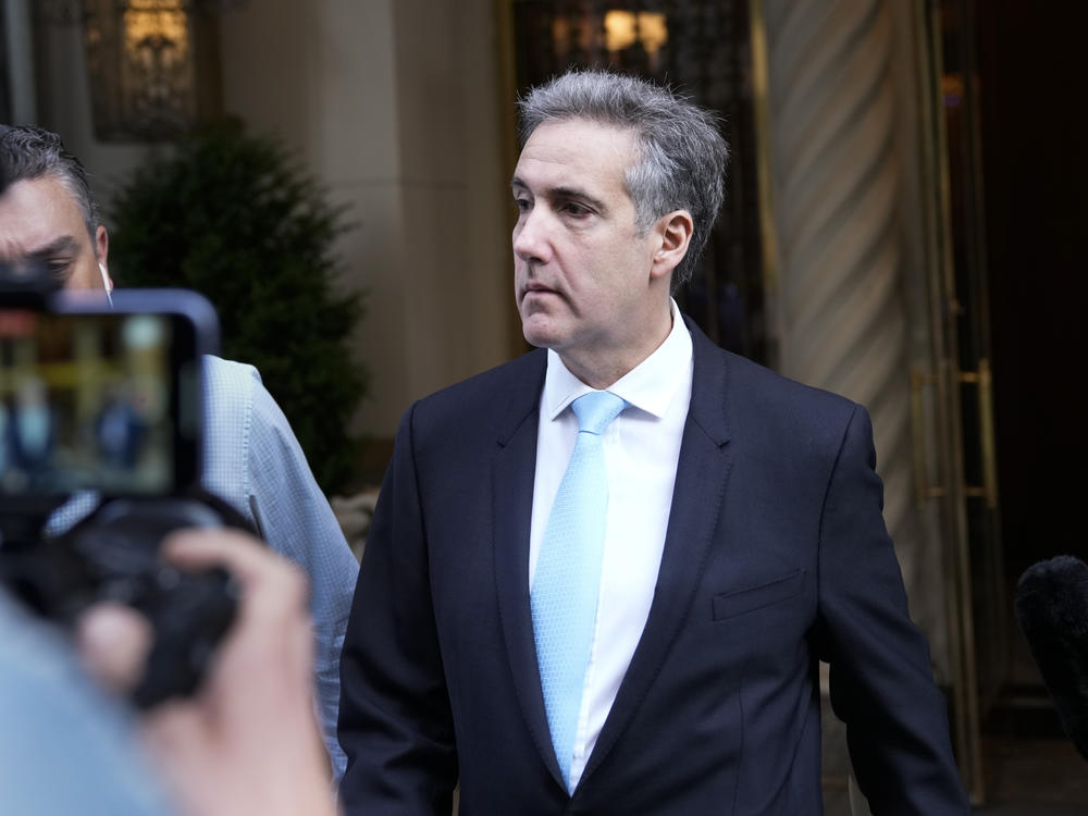 Michael Cohen, former President Donald Trump's ex-fixer, leaves his apartment building in New York Tuesday morning.
