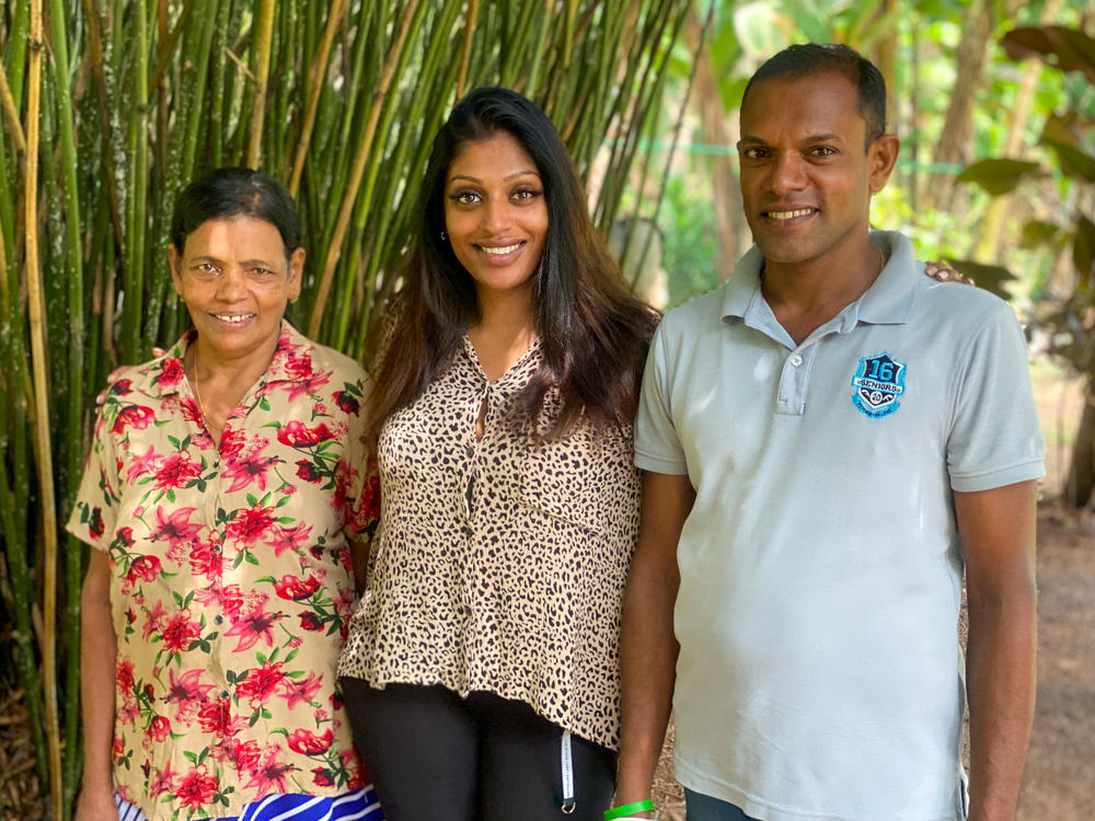 Linn Sjöbäck (center) is an adoptee who was born in Sri Lanka and lives in Sweden. She recently was reunited with her brother and mother following a video call in 2022.