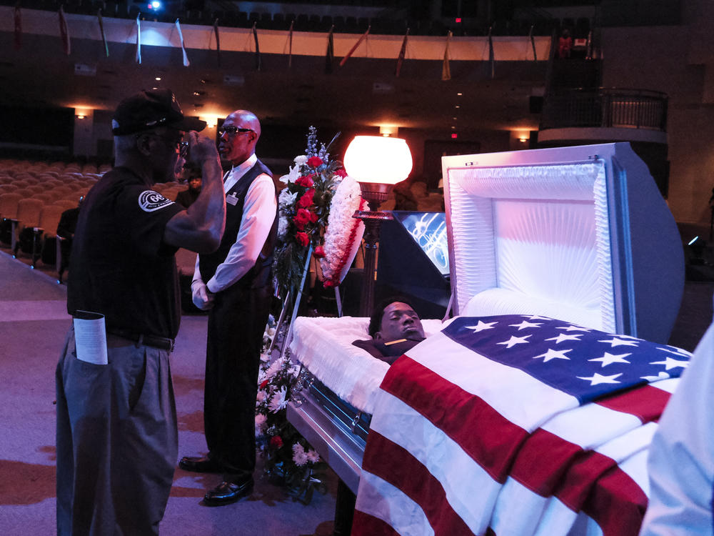 Members of the Air Force pay their final respects to Fortson.