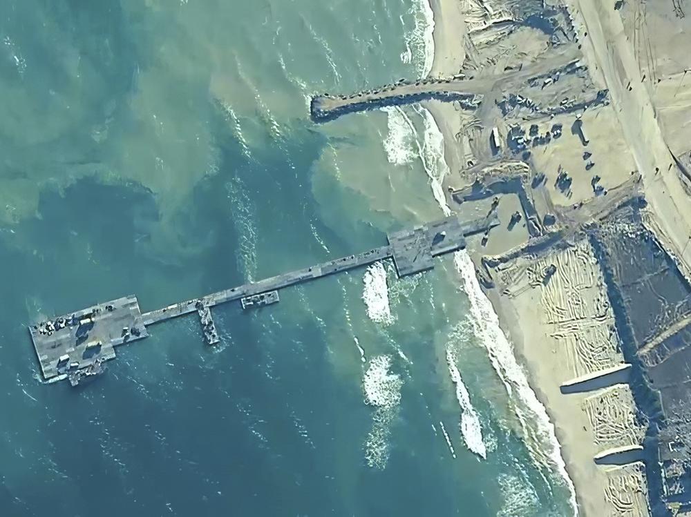 The U.S. military finished installing the floating pier in Gaza on Thursday, with officials poised to begin ferrying badly needed humanitarian aid into the enclave besieged over seven months of intense fighting in the Israel-Hamas war.