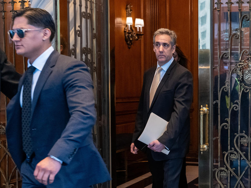 Michael Cohen leaves his apartment building on his way to Manhattan Criminal Court on Thursday.