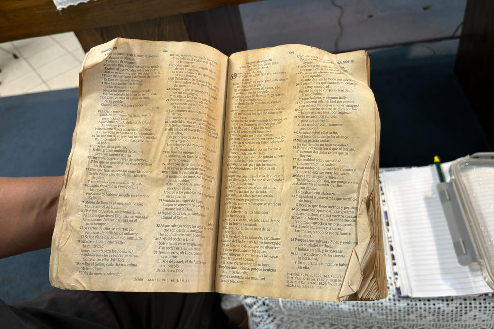 A Spanish-language bible — now on display at Iglesia Luterana San Lucas in Eagle Pass, Texas — is believed to have been carried by a migrant when the person was washed away by the river.