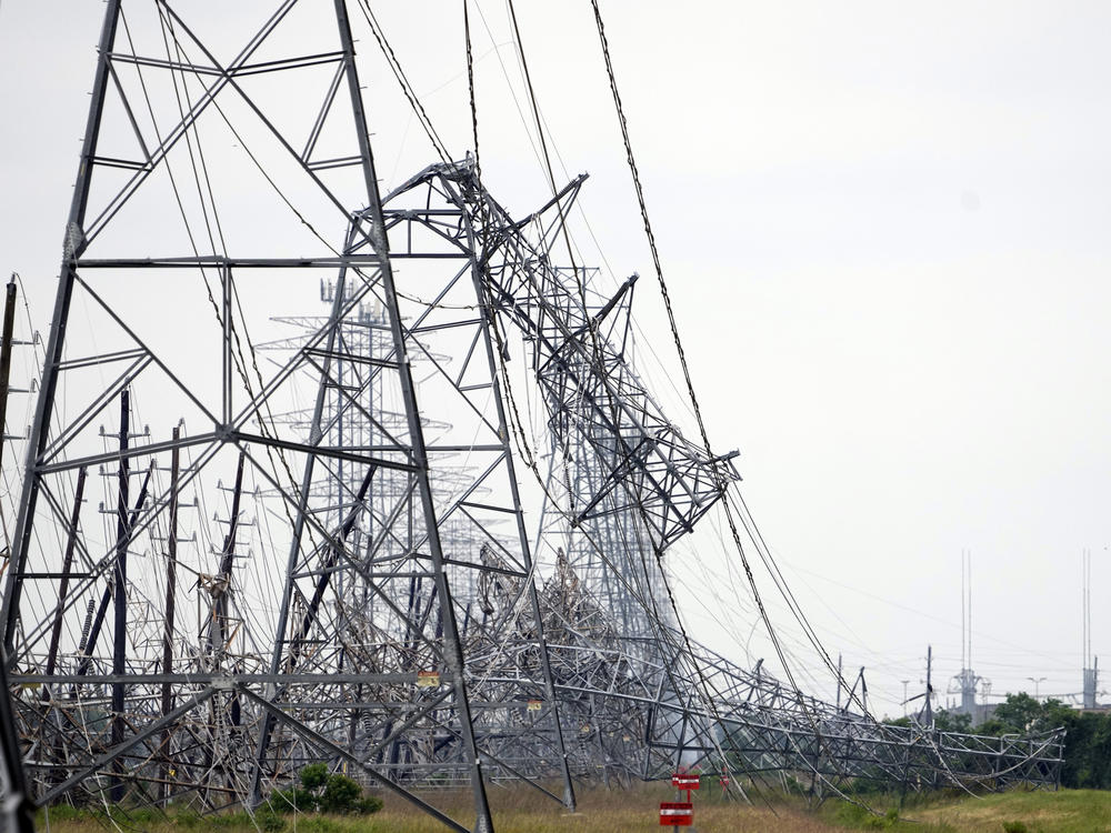 Down power lines are shown in the aftermath of a severe thunderstorm on Friday, near Houston.