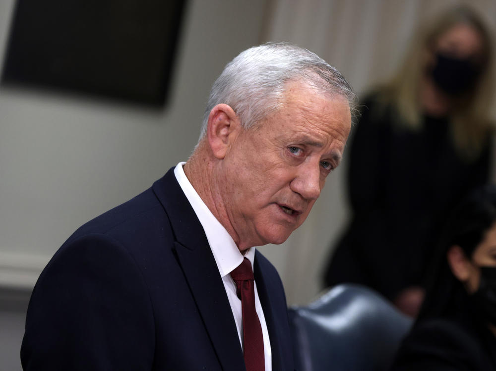 Benny Gantz speaks at the Pentagon in December 2021 in Arlington, Va. Gantz, a former army chief and current minister in Israel's three-member war cabinet, said he would quit the government in three weeks if Prime Minister Benjamin Netanyahu does not advance a plan to replace Hamas in Gaza.
