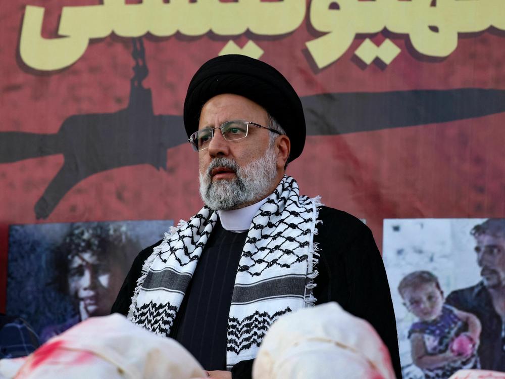 Iranian President Ebrahim Raisi speaks to crowds gathered to protest in Tehran in support of Palestinians in Gaza on Oct. 18, 2023.