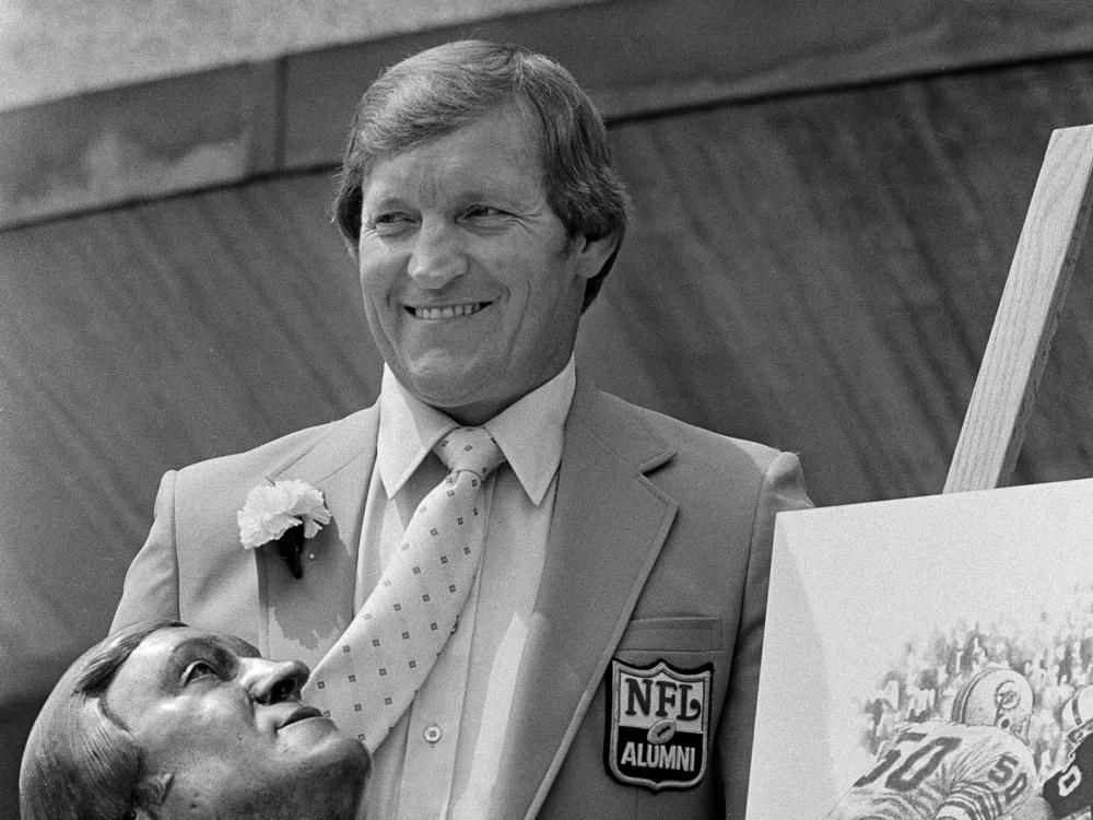 Jim Otto, former center for the Oakland Raiders, poses with his bust after enshrinement in the in the Pro Football Hall of Fame in Canton, Ohio, Aug. 2, 1980.
