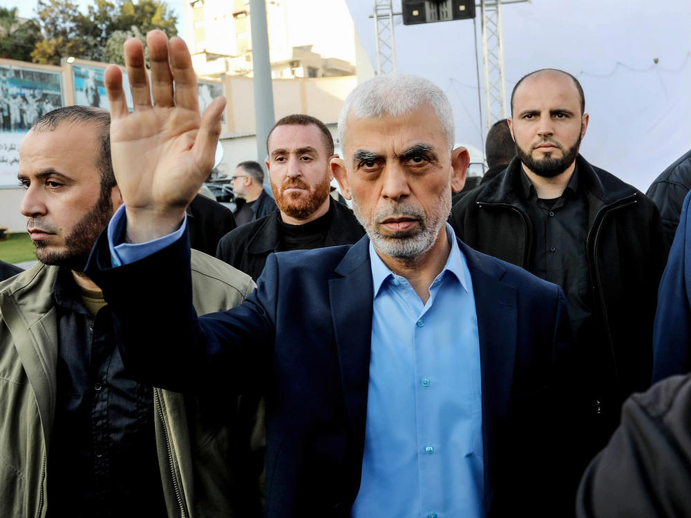Yahya Sinwar, the leader of Hamas in the Gaza Strip, waves to a crowd in Gaza City in April 2023.