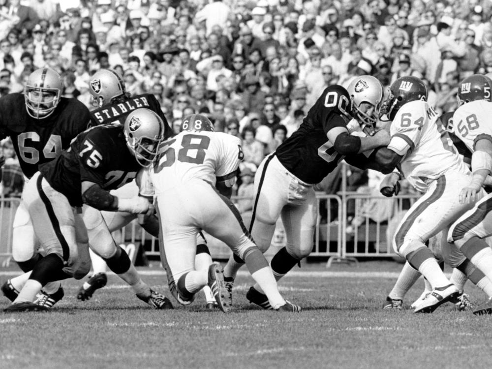 JIm Otto of the then-Oakland Raiders, wearing his iconic jersey with the numbers 00, is pictured in action during a game against the New York Giants in Oakland, Calif., on Nov. 5, 1973.