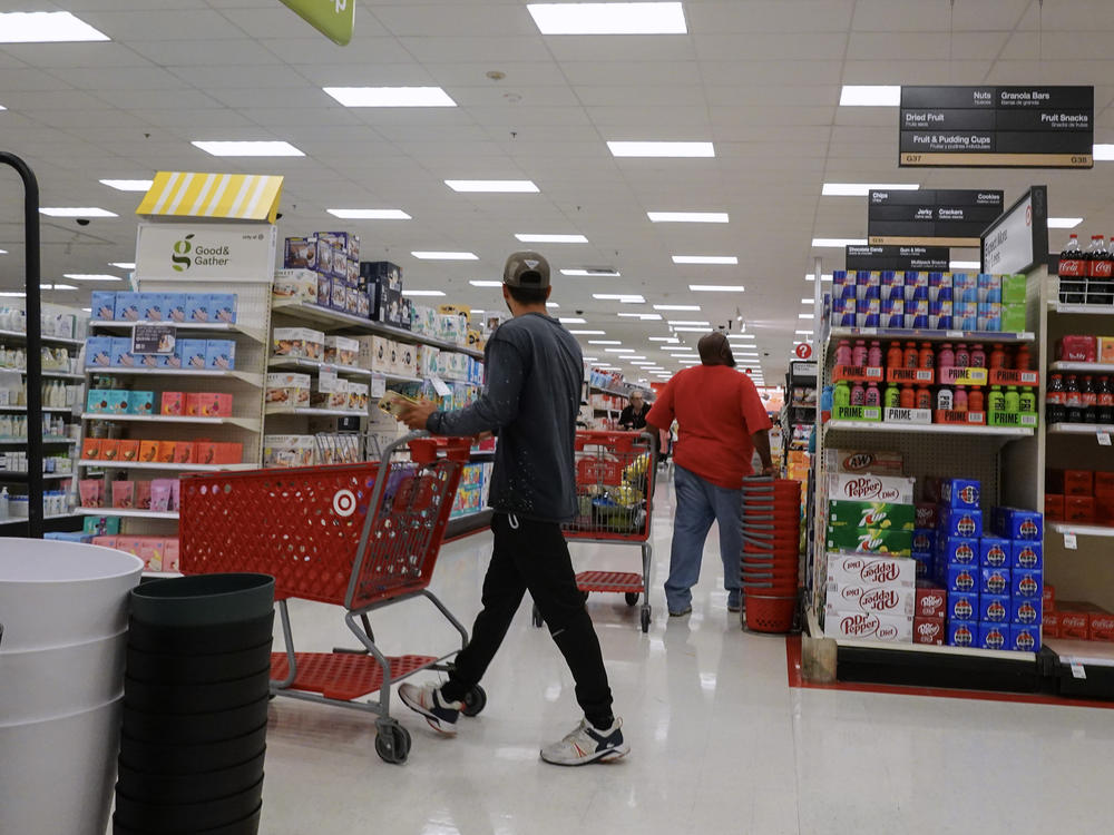 Customers shop at a Target store on Monday in Miami.