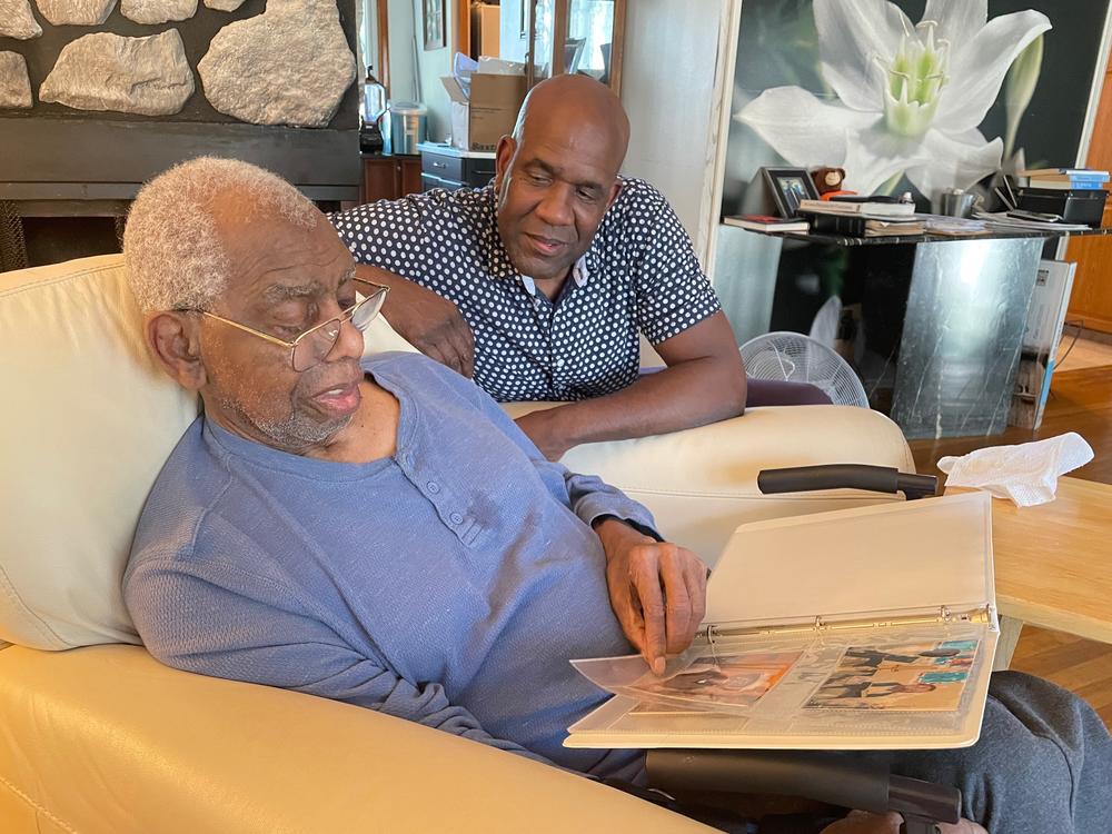 Robert Turner is with his dad, Robert Turner, Sr. As a professor and researcher, the younger man is studying the significant portion of African American men who are caregivers.