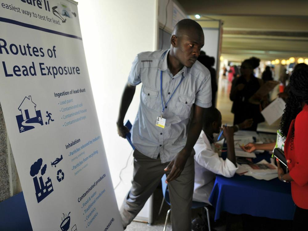 Lead poisoning is now getting more attention — and funds to fight it. Above: At a U.N. conference in Kenya, a booth offers information about testing and treatment.