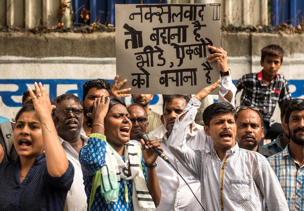 Demonstrators protest in Mumbai on June 8, 2018, over the arrests of social activists by Indian police.