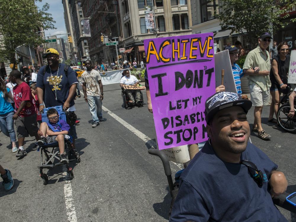 People participate in the first annual Disability Pride Parade on July 12, 2015 in New York City.