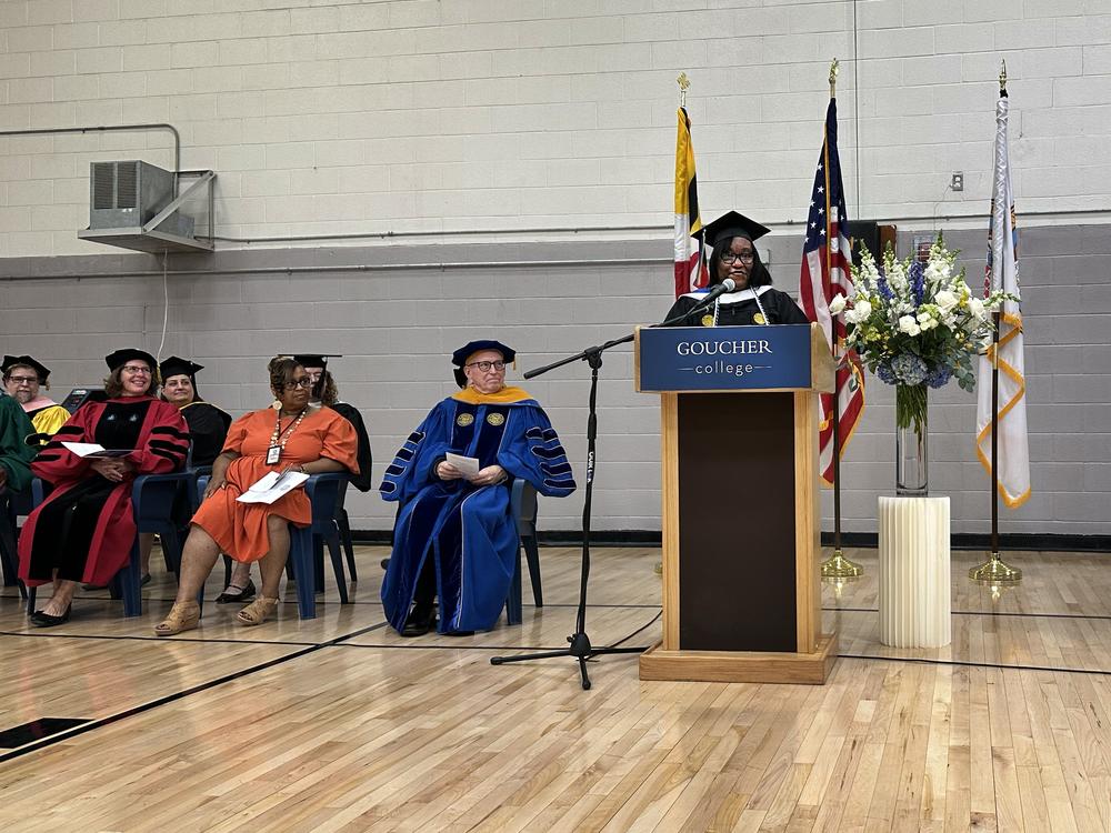 Janet Johnson, who spent the last 10 years working toward a college degree in prison, presents her senior thesis at her college graduation ceremony.