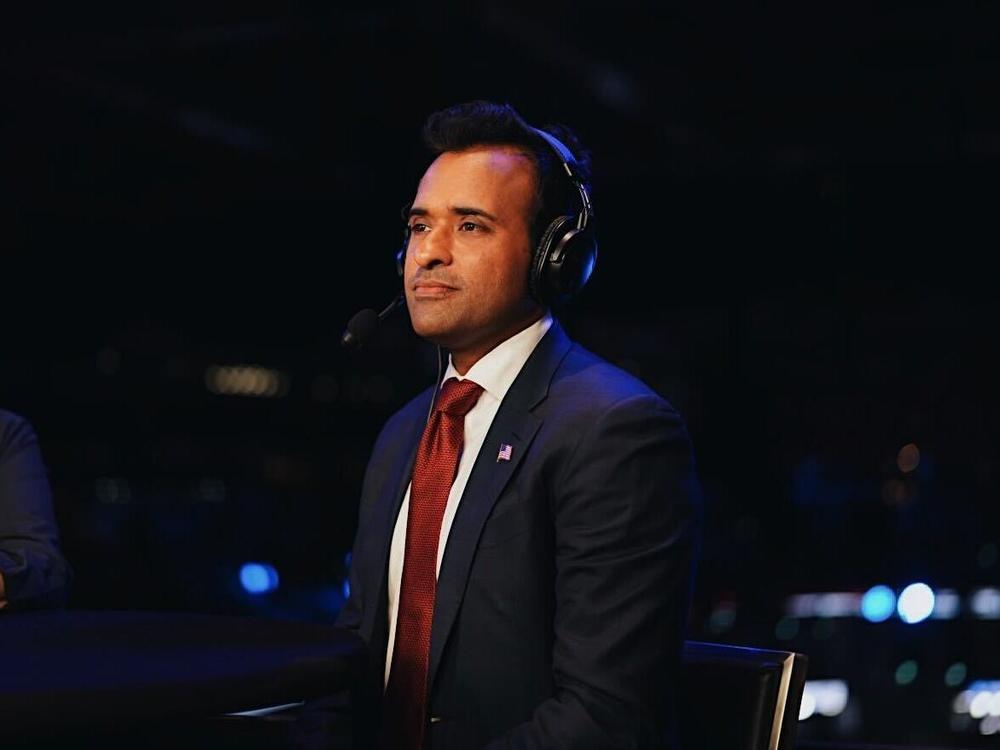  Businessman and former Republican presidential candidate Vivek Ramaswamy speaks to NPR at the Republican National Convention in Milwaukee on Wednesday night. 
