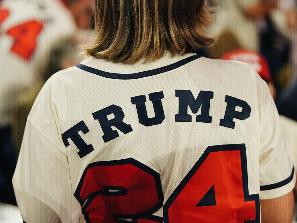 Rachel Wallace, delegate from Munford, Ala., shows us the back of her jersey on the third day of the Republican National Convention.