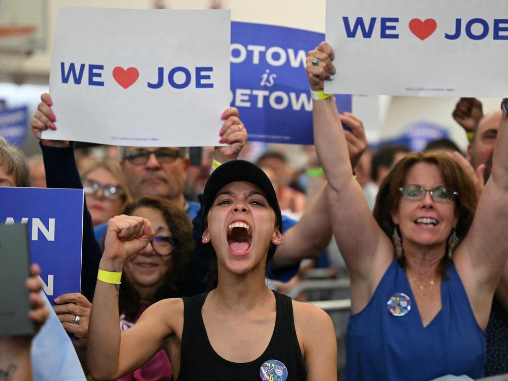 People cheer as President Biden speaks during a campaign event in Detroit on July 12, a rally where there were chants of 