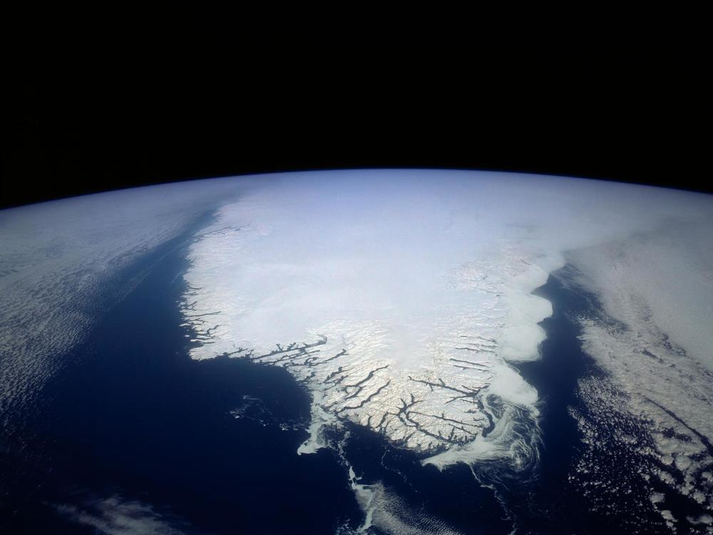 Ice melting from Greenland and the polar regions is causing sea levels to rise, shifting mass around the planet in a way that's starting to slow its spin, scientists are finding.