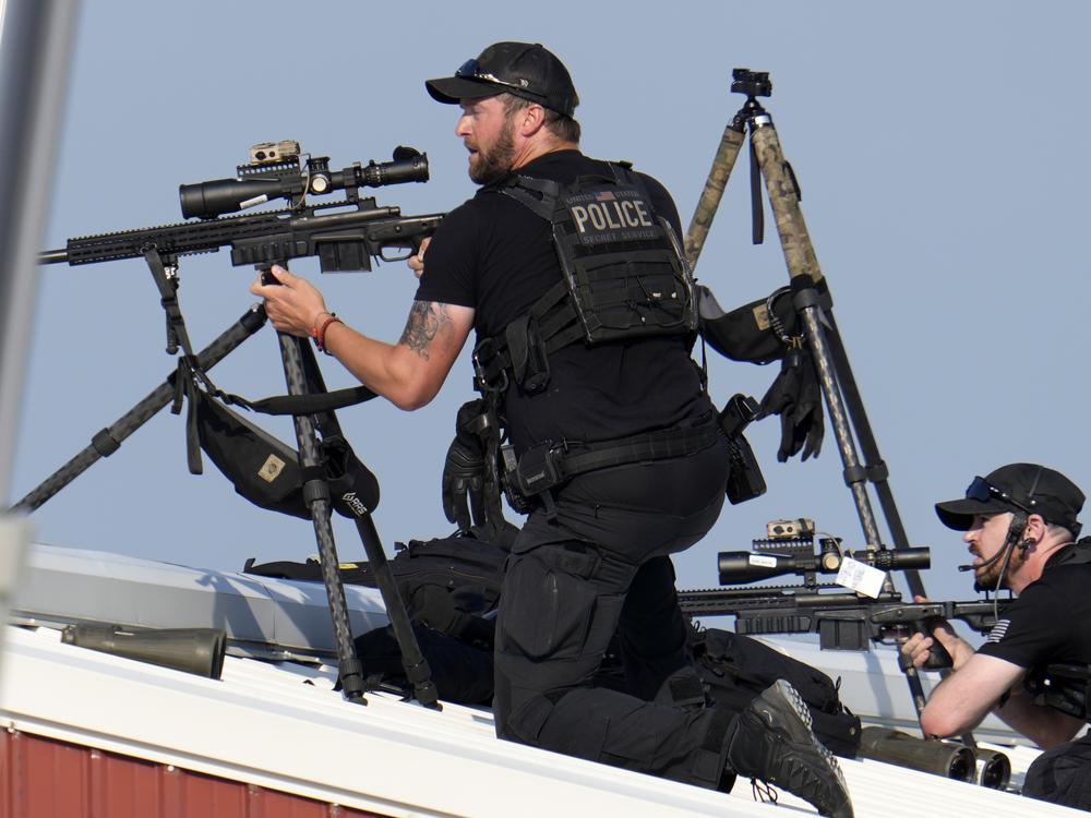 Police snipers return fire after shots were fired while former President Donald Trump was speaking at the campaign rally on July 13.