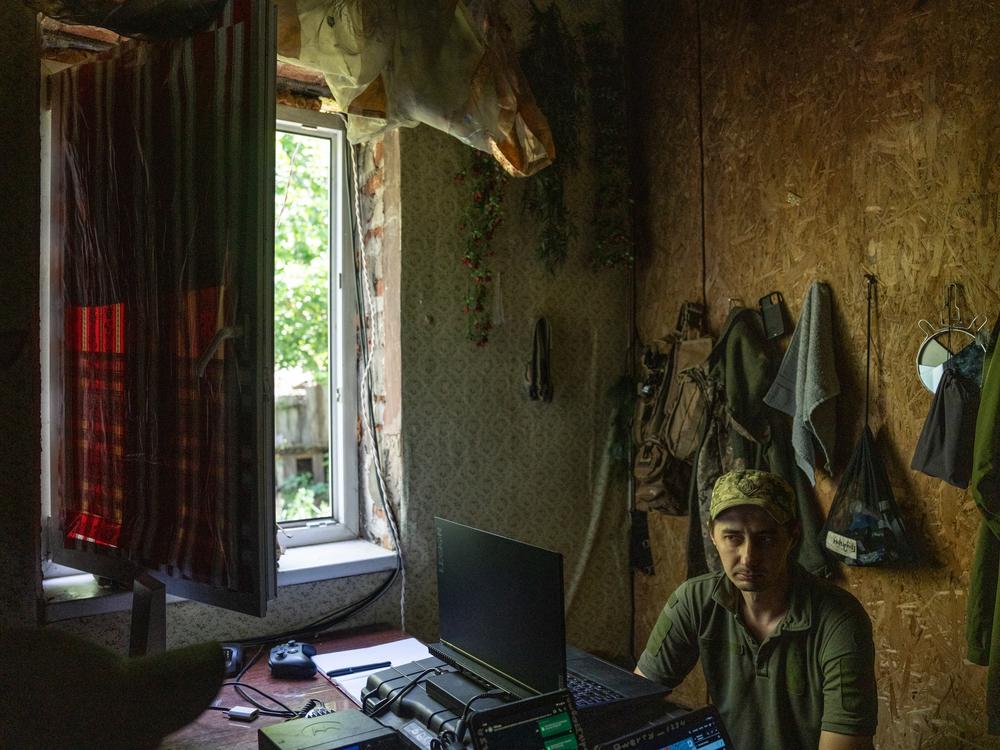 Rodion, a soldier with the 57th brigade, in the command center for an artillery unit in the Kharkiv region on May 29.