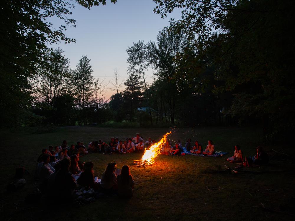 Campers end the day with a <em>vatra</em>, or bonfire, singing and storytelling in Ukrainian.