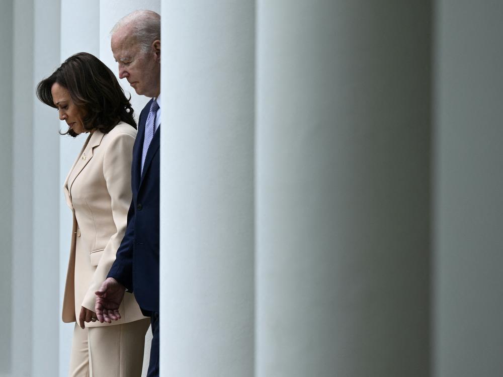 Vice President Harris and President Biden arrive at the Rose Garden of the White House on May 1, 2023.