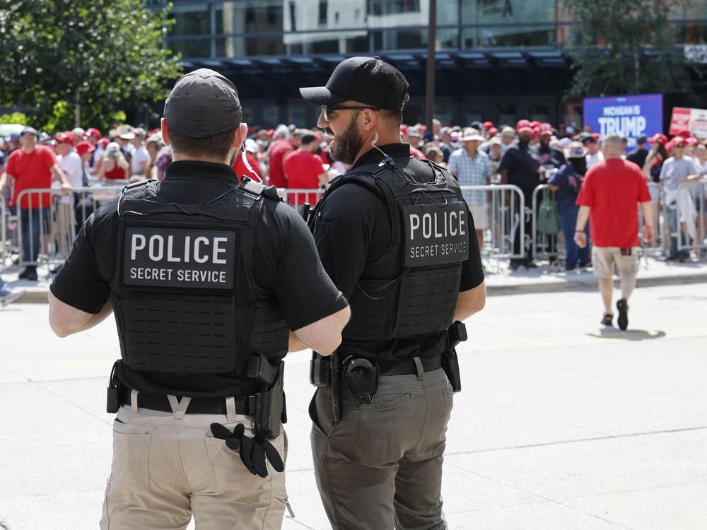 U.S. Secret Service police provide security before former President Trump and vice presidential nominee JD Vance speak at their first campaign rally together in Grand Rapids, Mich., on Saturday.