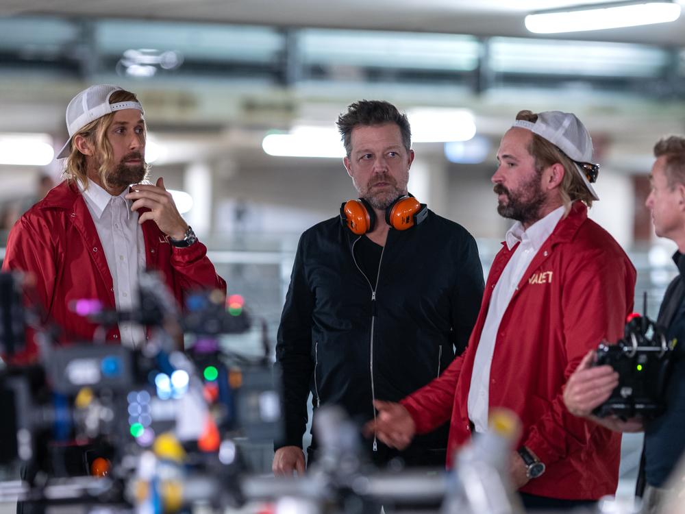  Ryan Gosling, David Leitch and stunt performer Logan Holladay on the set of <em>The Fall Guy. 
