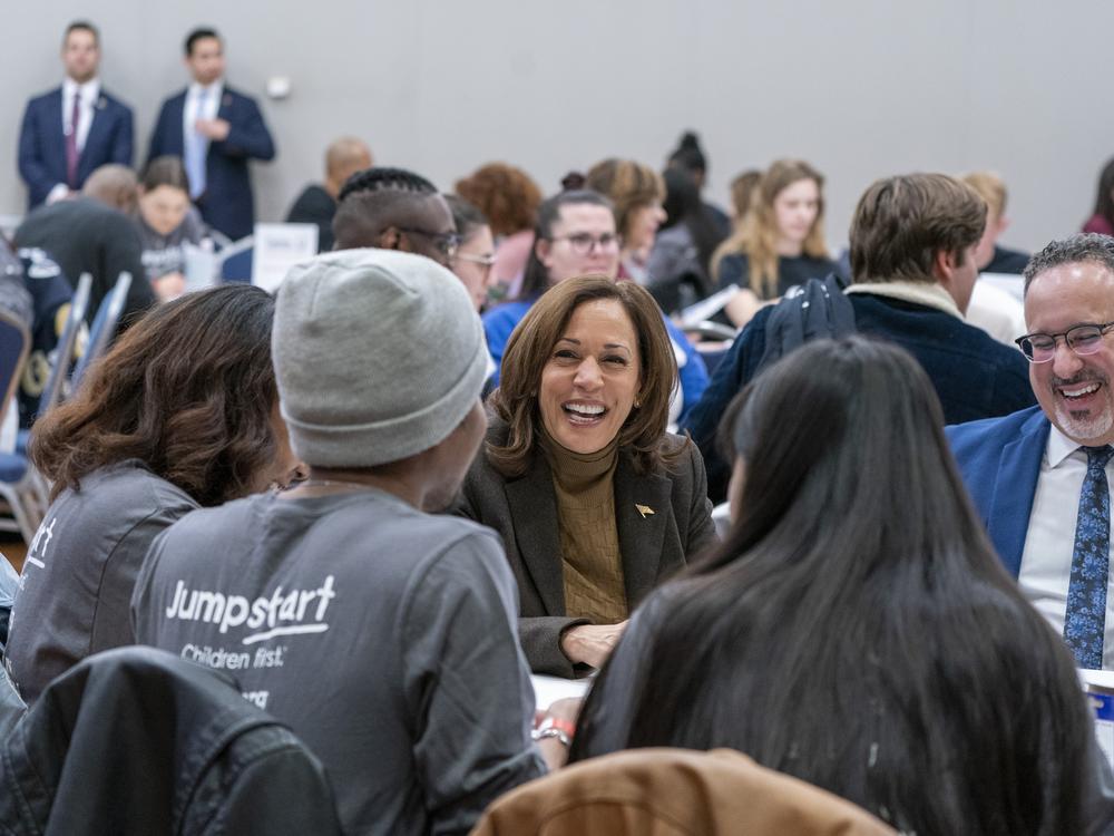 In this 2023 file photo, Vice President Kamala Harris works on a Martin Luther King, Jr., day of service project, next to Education Secretary Miguel Cardona, right, with students at the George Washington University, Monday, Jan. 16, 2023.