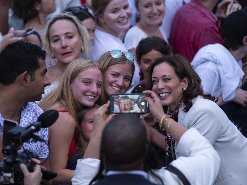 Vice President Kamala Harris greets visitors during a Fourth of July celebration for military and veteran families on the South Lawn of the White House, Thursday, July 4.