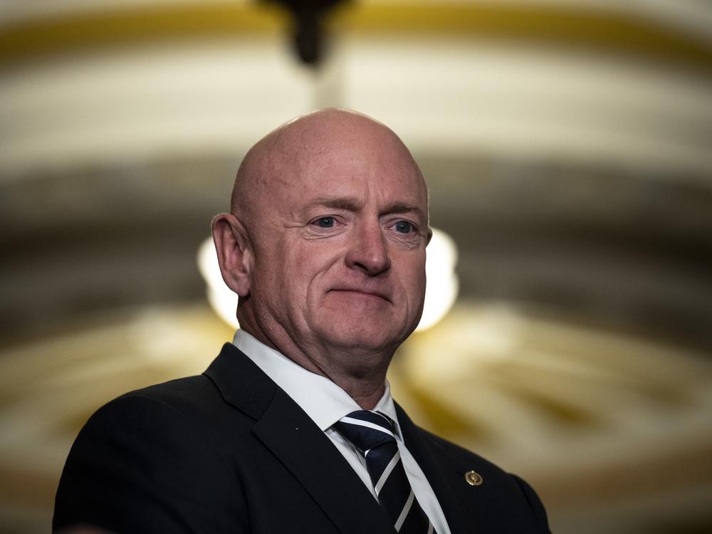 Sen. Mark Kelly (D-AZ) waits to speak during a news conference following a closed-door lunch meeting with Senate Democrats at the U.S. Capitol March 22, 2023 in Washington, DC.