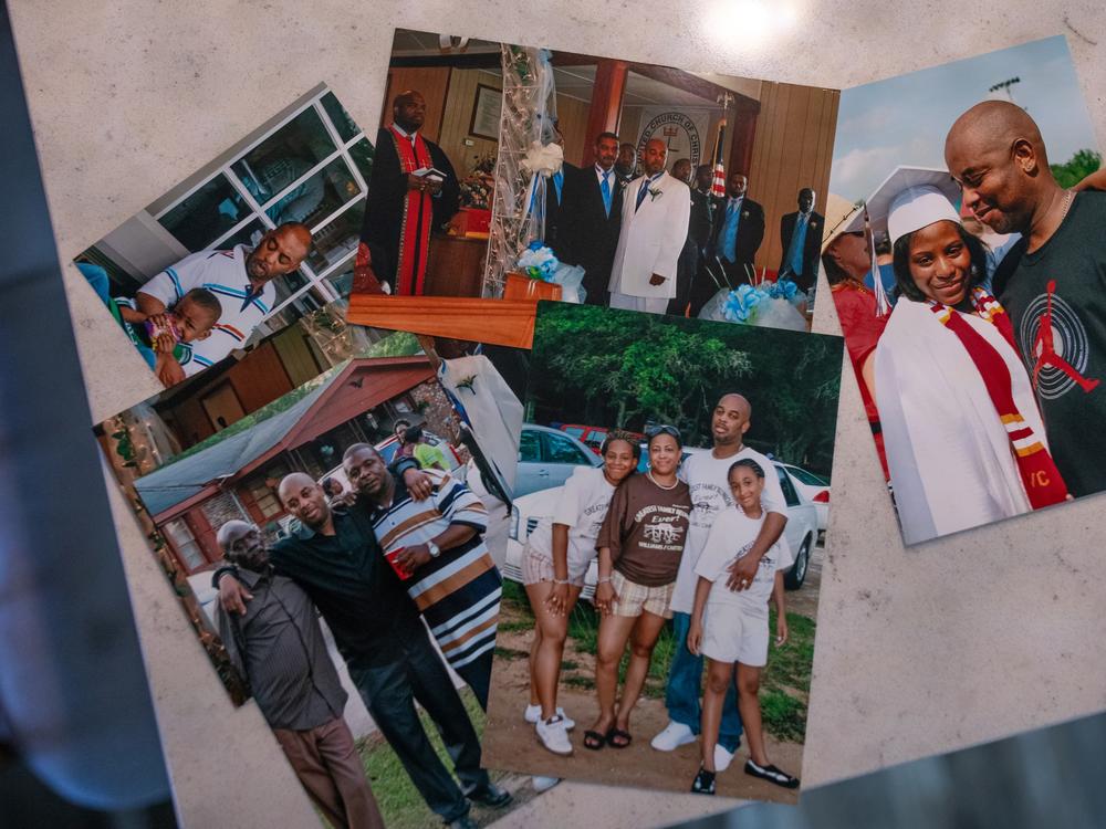 Family photos sit on the counter at Melinda Mattocks-Ushry’s home in New Bern, N.C. Her brother Kelvin “Chuck” Mattocks was killed in 2016 at a Boston construction site when a trench he was working in collapsed. 