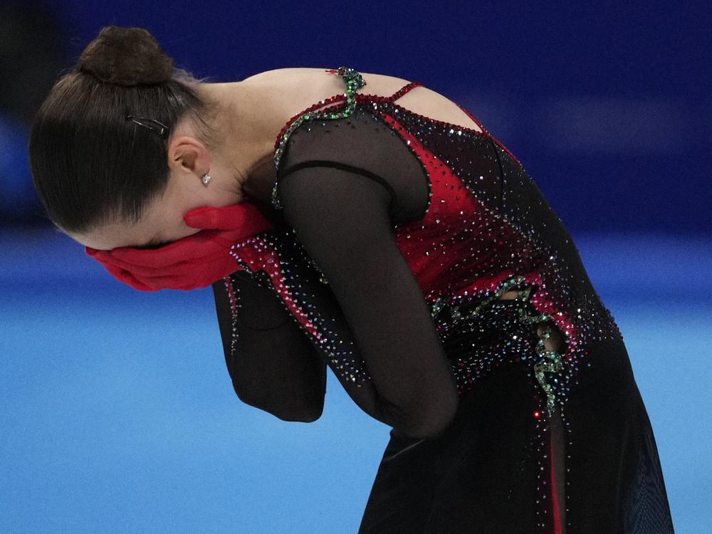 Kamila Valieva, of the Russian Olympic Committee, reacts after the women's free skate program during the figure skating competition at the 2022 Winter Olympics, Thursday, Feb. 17, 2022, in Beijing.  An international sports tribunal has rejected Russian appeals of her disqualification linked to a sports doping scandal.  (AP Photo/Bernat Armangue, File)