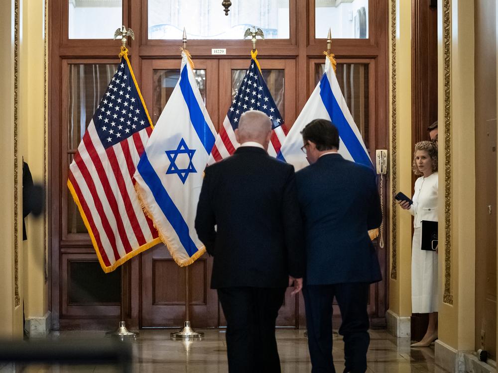 Prime Minister Benjamin Netanyahu and House Speaker Mike Johnson walk inside the Capitol before Netanyahu's address to a joint session of Congress on Wednesday.