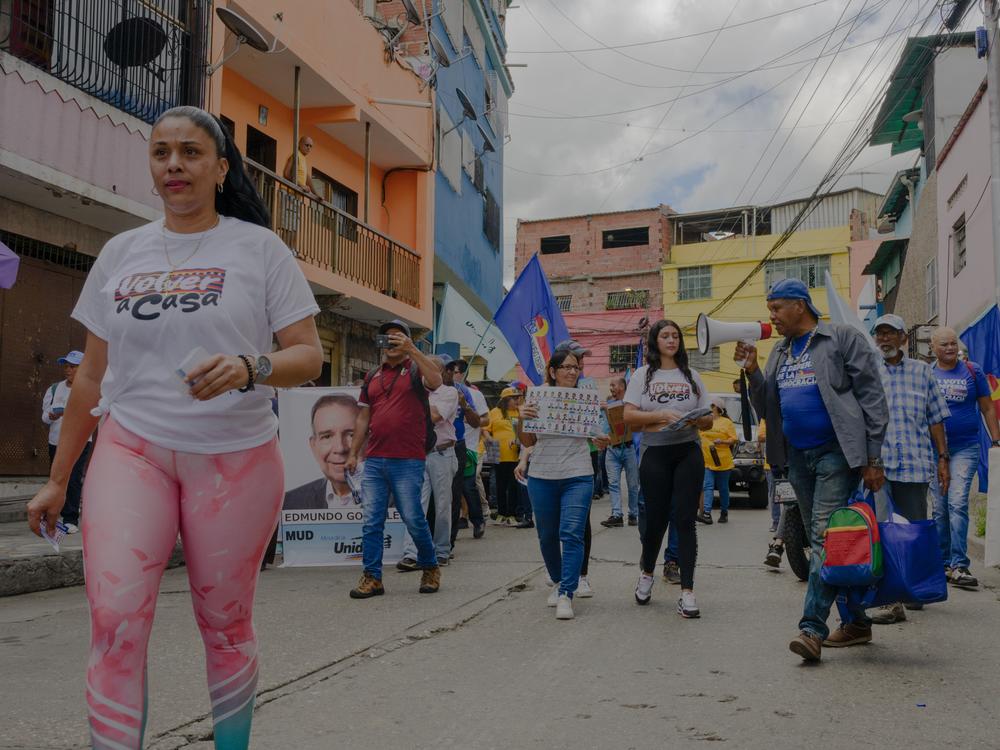 Residents and community organizers take the street Wednesday to show support for opposition candidate in Venezuela's presidential election, Edmundo Gónzalez Urrutia, in the neighborhood of La Vega, in Venezuela's capital of Caracas.