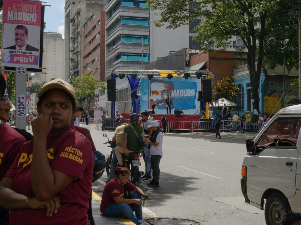 People attend a closing campaign event for President Nicolás Maduro in Caracas, where stages were set up all over the city and people were bused in from various Venezuelan states, on Thursday.