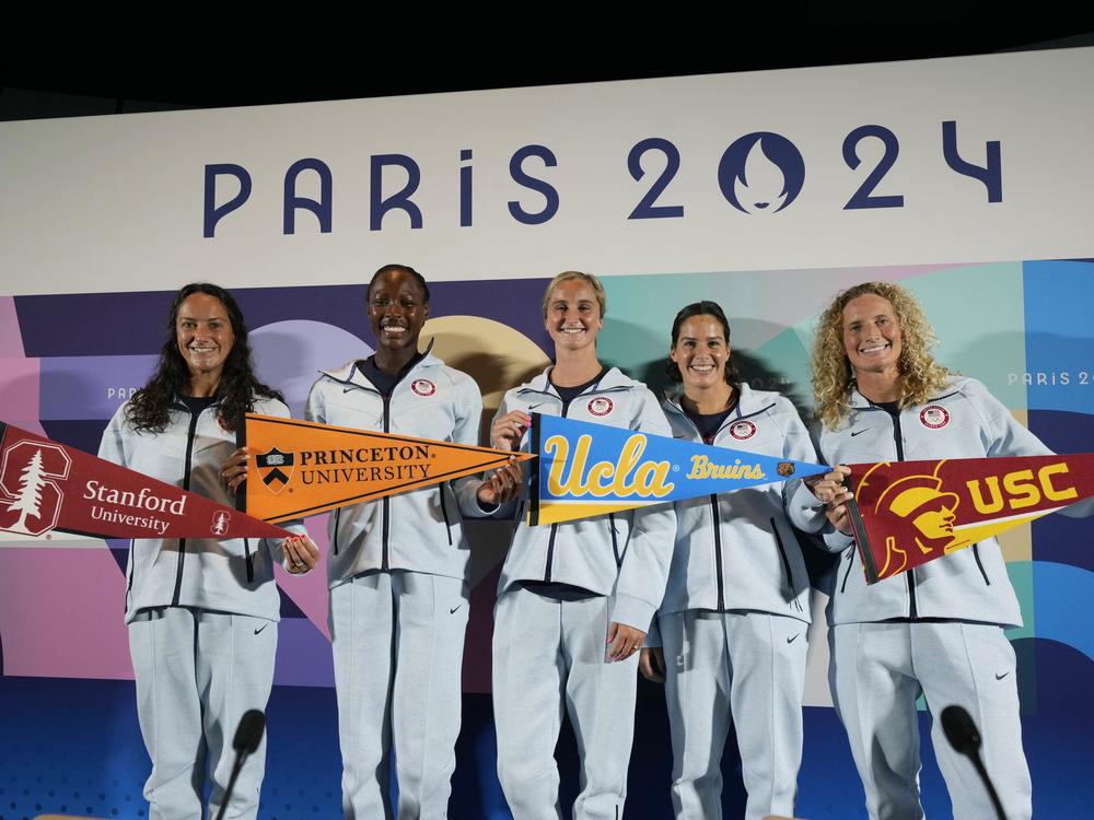 From left, United States' Maggie Steffens, Ashleigh Johnson, Madeline Musselman, Rachel Fatal and Kaleigh Gilchrist pose for photographers at the end of a news conference of the women's United States team ahead of the 2024 Summer Olympics on Wednesday in Paris.