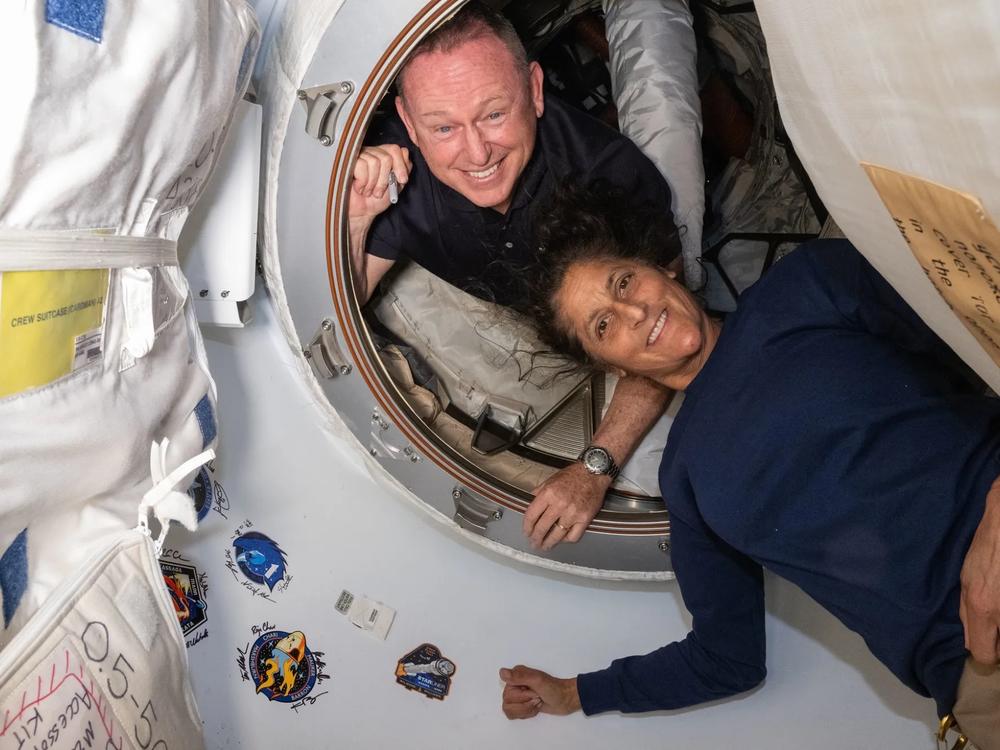 Butch Wilmore and Suni Williams inside the vestibule between the forward port on the International Space Station’s Harmony module and the Starliner spacecraft