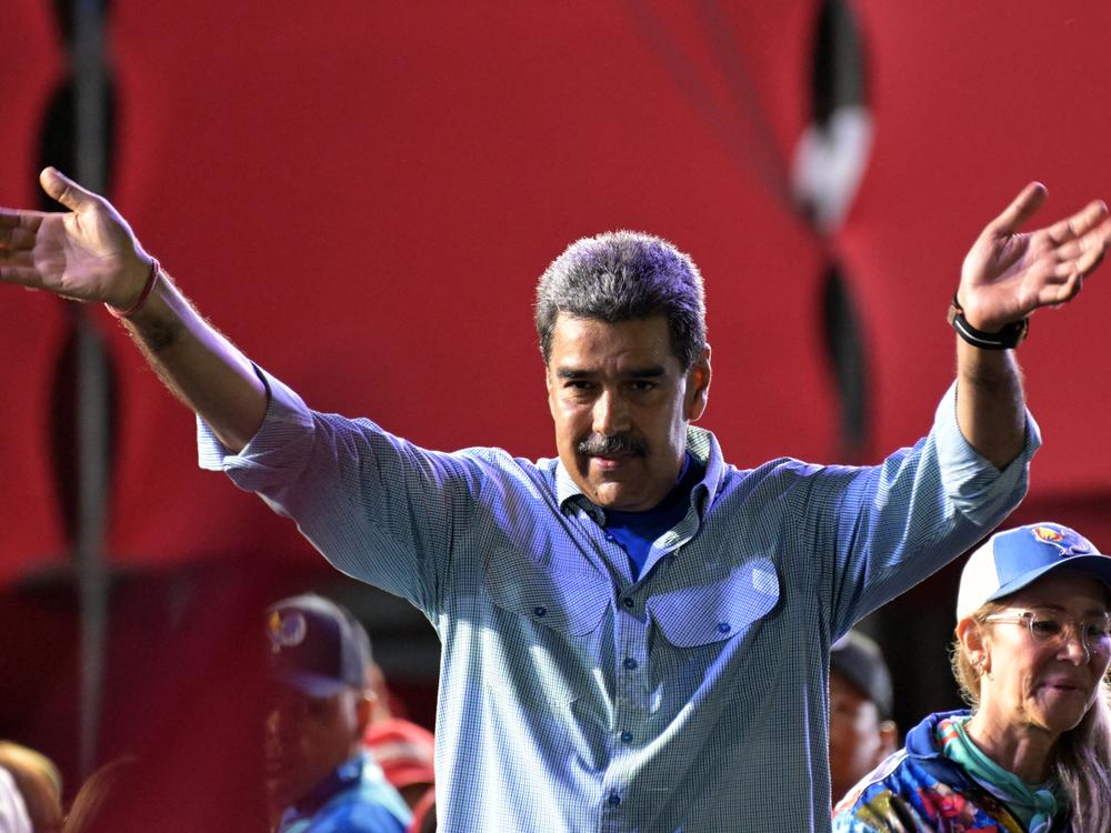 Venezuelan President Nicolás Maduro greets supporters at his campaign closing rally in Caracas on Thursday.