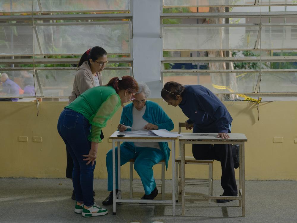 People vote in the Venezuelan presidential elections at the Andrés Bello school in Caracas on Sunday.